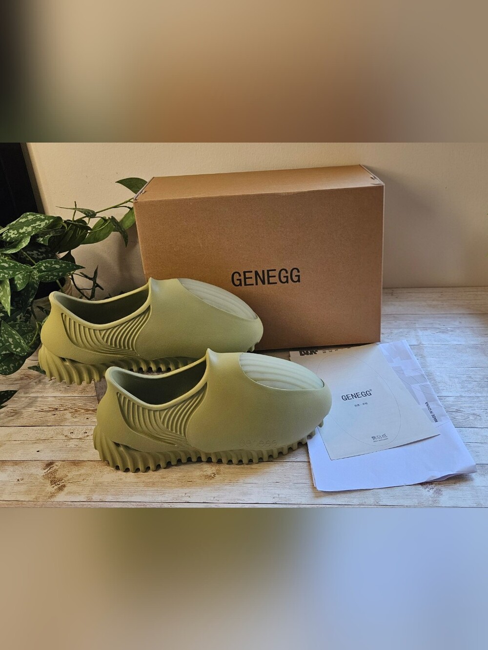 Genegg men size 9.5 Whale Foam Runners, specifically in the Olive Green colorway